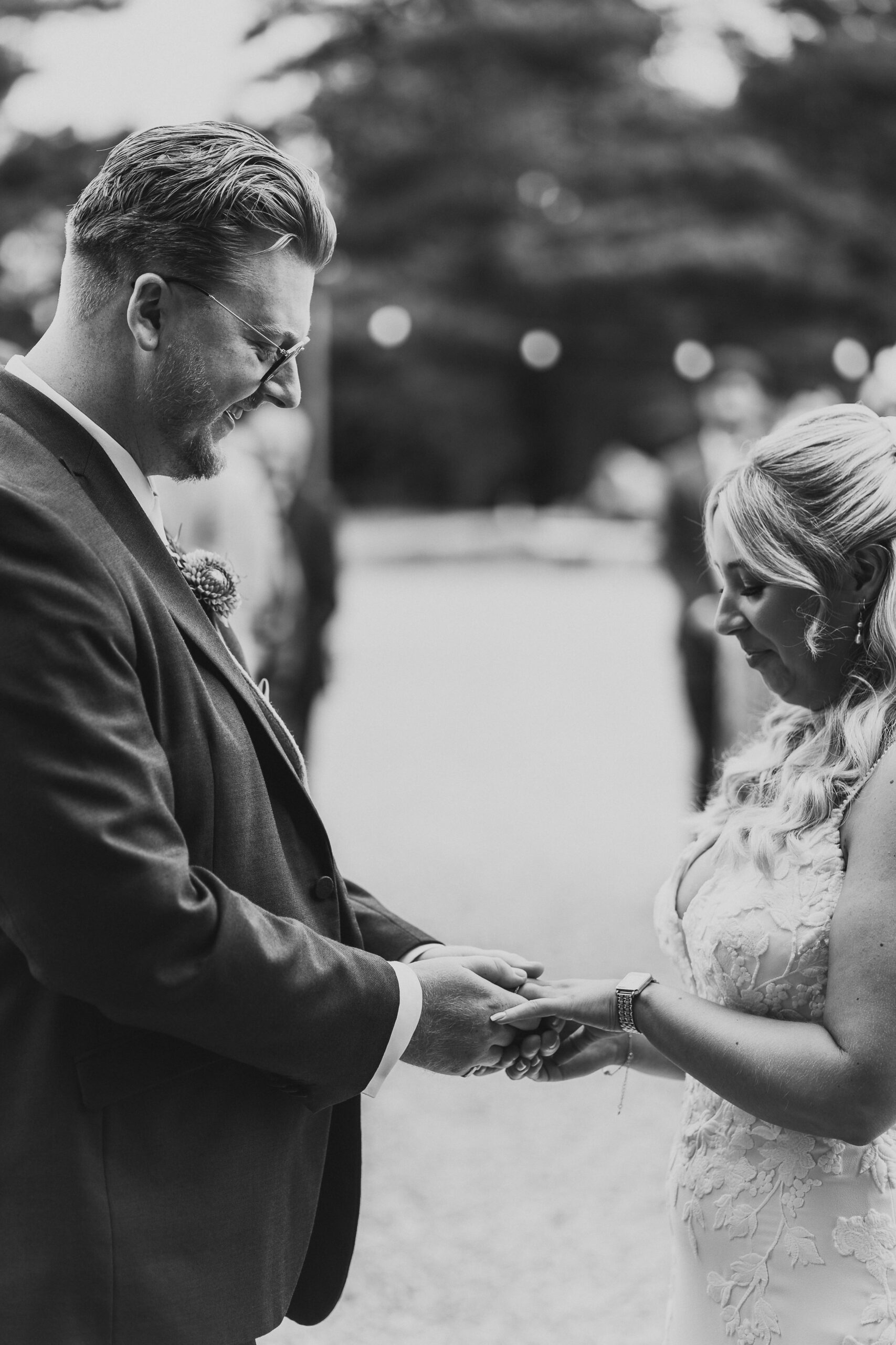 Couple marrying at outdoor ceremony at Shropshire wedding venue, Pimhill Barn